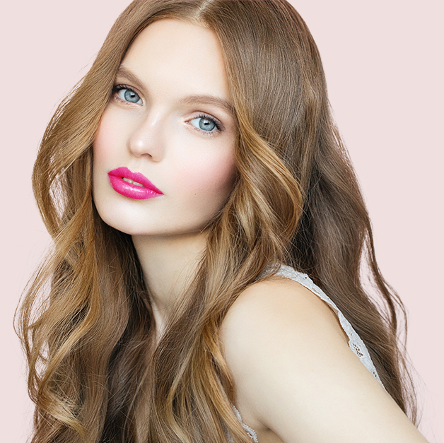 07 Fuchsia Shock - Natural Pink Lipstick on a model 