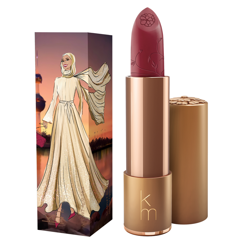 Lipstick with a decorative case featuring a woman in a hijab against a sunset background.