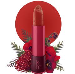 Red lipstick with floral and leaf decorations on a white background