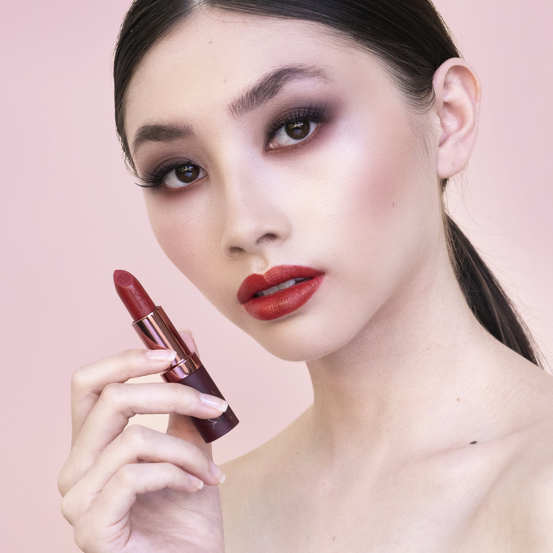 lady wearing reddish brown lipstick