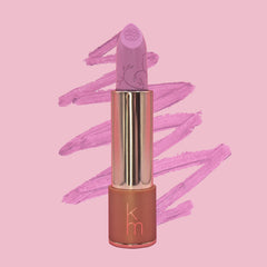 lilac lipstick with it's swatch in a squiggly line 