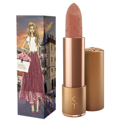 Nude Lipstick with bronze case and matching packaging featuring a woman and castle design.