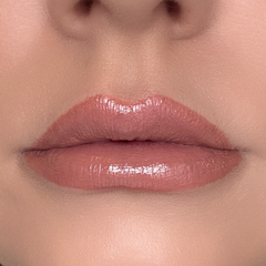 Nude lipstick on lips 