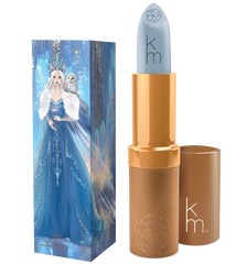 Lipstick with gold casing and blue cap, accompanied by a decorative box featuring a character in a blue gown.