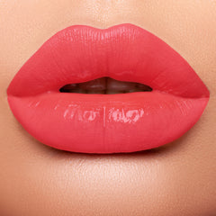 lips with bright coral lipstick 
